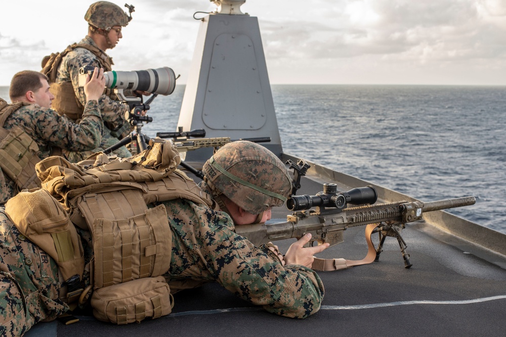 Snipers provide over-watch during VBSS mission