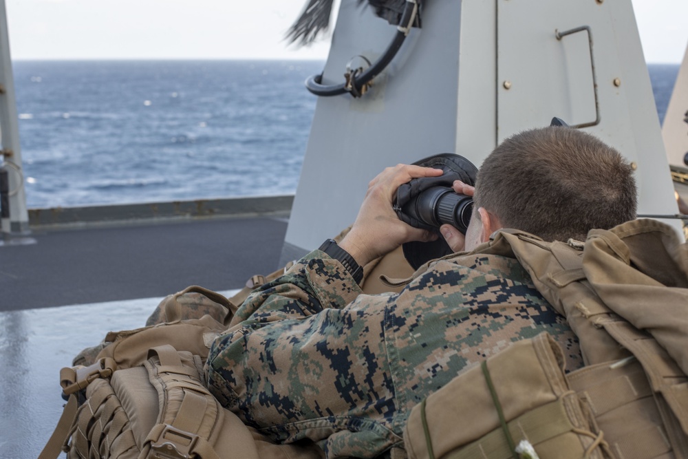 Snipers provide over-watch during VBSS mission