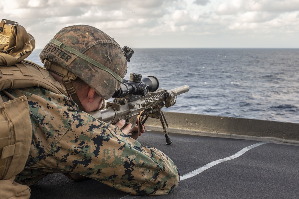 Snipers provide over-watch during VBSS mission