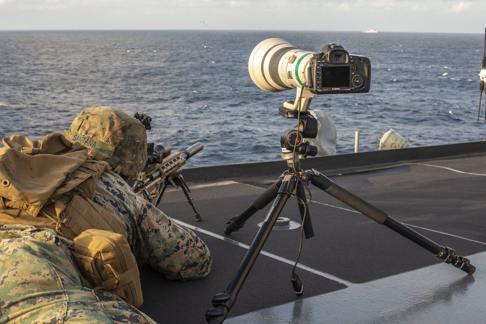 Snipers provide over-watch during VBSS mission