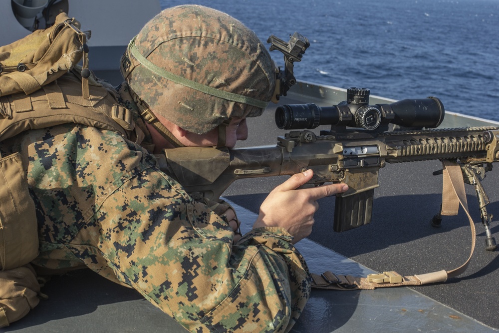 Snipers provide over-watch during VBSS mission