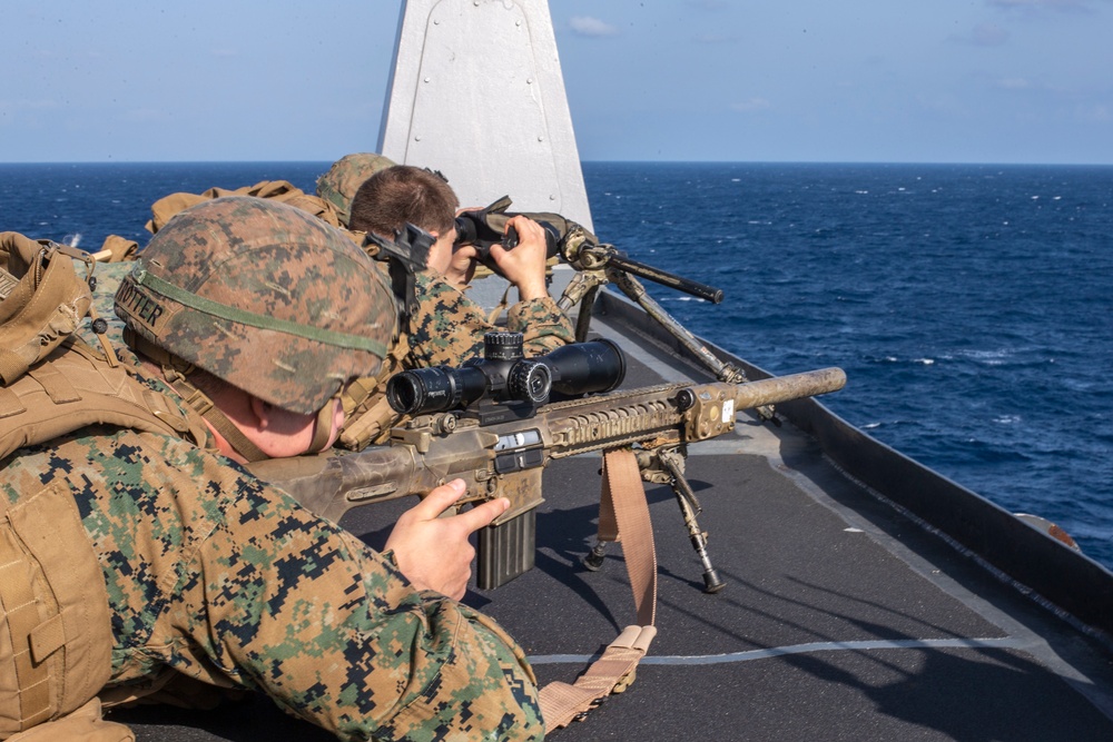 Snipers provide over-watch during VBSS mission