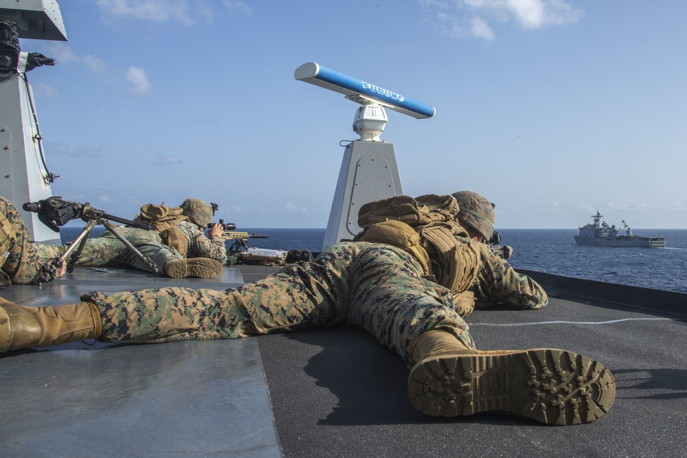 Snipers provide over-watch during VBSS mission