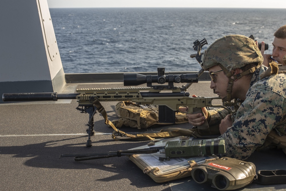 Snipers provide over-watch during VBSS mission