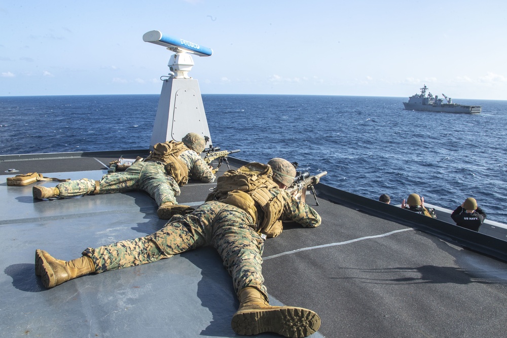 Snipers provide over-watch during VBSS mission