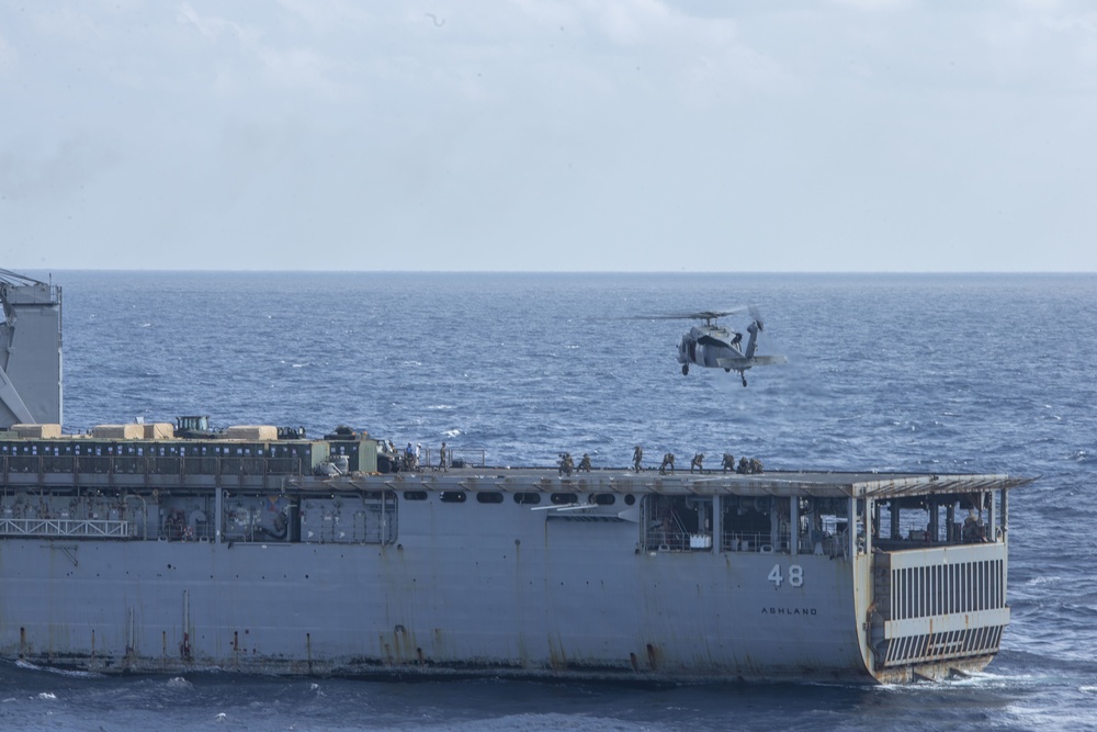 Snipers provide over-watch during VBSS mission