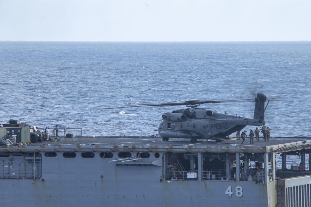 Snipers provide over-watch during VBSS mission