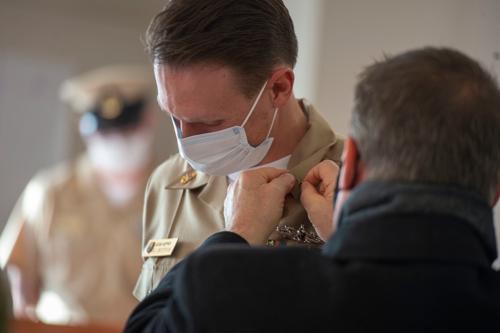 Chief Religious Program Specialist Jesse Kiepper, receives his anchors during USS Constitution’s Chief Petty Officer pinning ceremony