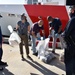 Coast Guard transfers 2 suspected smugglers, $8.5 million in seized cocaine to Caribbean Corridor Strike Force federal agents in San Juan, Puerto Rico