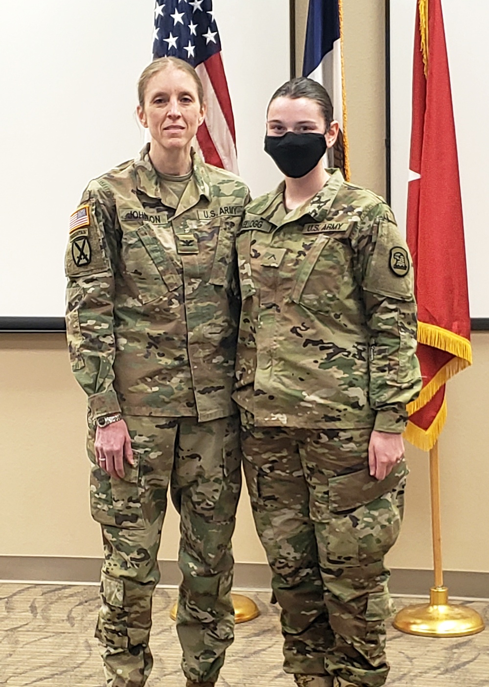 Col. Wendy Johnson poses for a photo with Pvt. Megan Kellogg of the Iowa National Guard