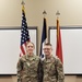Col. Wendy Johnson, Deputy Commander Clinical Services poses with her husband, both serve in the Iowa National Guard