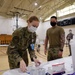 Airmen from the 621st Contingency Response Wing receive a COVID-19 vaccination