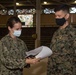 U.S. Marine Corps Brig. Gen. Mark Hashimoto receives his second dose of the COVID-19 vaccine