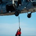 USS Carl Vinson (CVN 70) and Helicopter Sea Combat Squadron (HSC) 4 Conduct a Vertical Replenishment