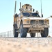 Members of the 332 Expeditionary Security Forces Squadron Sweep Perimeter Road