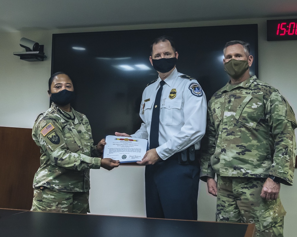 Deputy Chief Jeffrey J. Pickett recieves the Maryland Civilian Service Medal