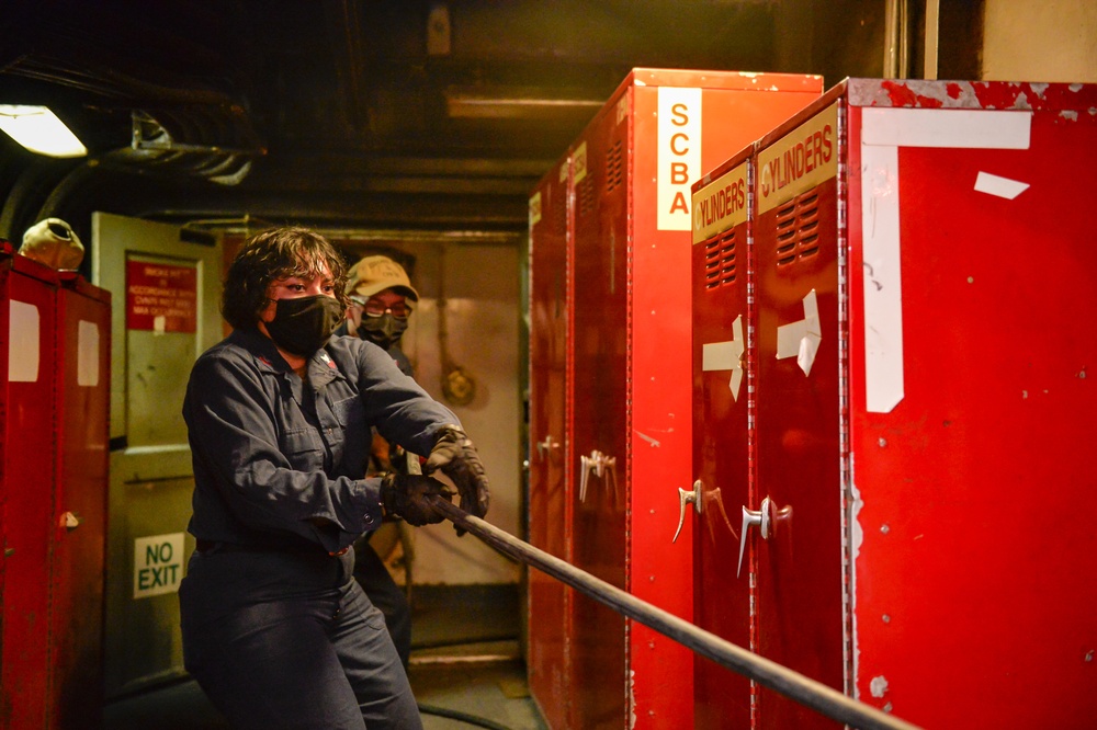 USS Carl Vinson (CVN 70) Sailors Heave in a Cable