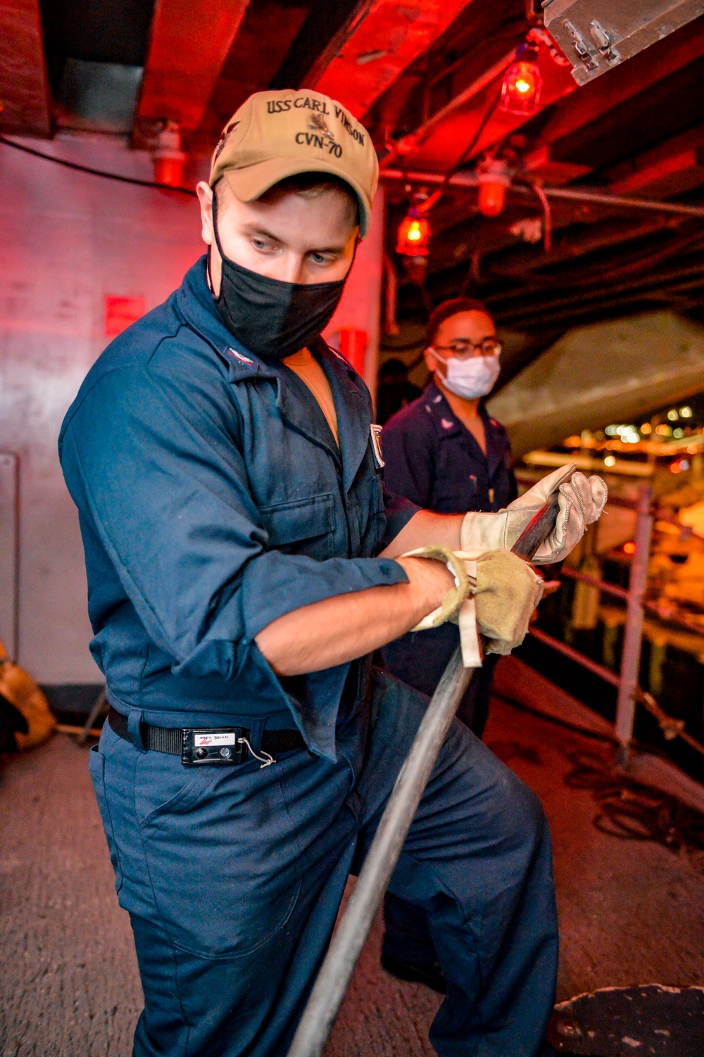 USS Carl Vinson (CVN 70) Sailors Heave in a Cable