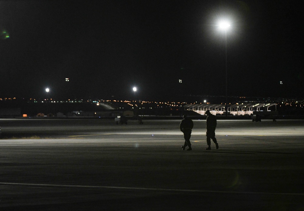 Team Whiteman Airmen walking back to their RF 21-1 maintenance shop