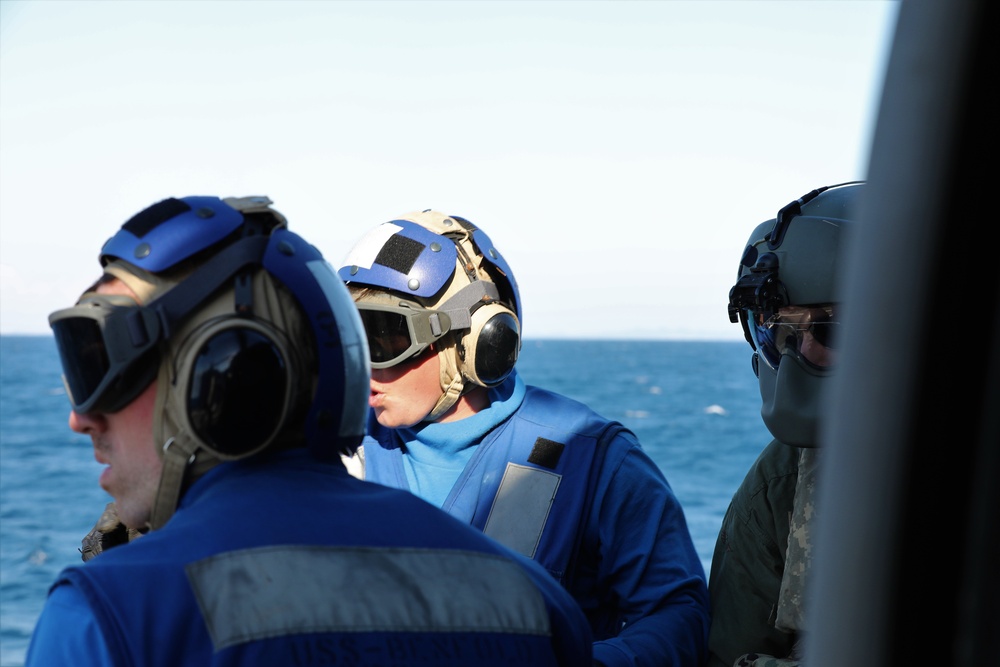 U.S. Army Aviation Battalion-Japan conducts deck landing qualifications with USS Benfold (DDG-65)