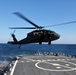 U.S. Army Aviation Battalion-Japan conducts deck landing qualifications with USS Benfold (DDG-65)