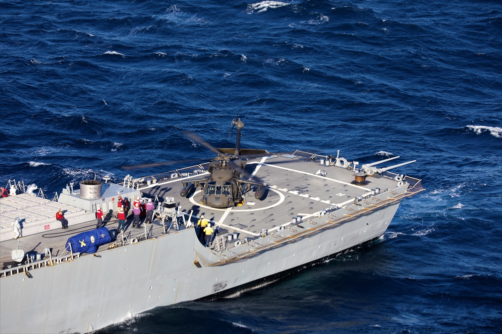 U.S. Army Aviation Battalion-Japan conducts deck landing qualifications with USS Benfold (DDG-65)