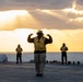 Sailors assigned to the forward-deployed amphibious assault ship USS America (LHA 6) conduct flight operations