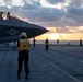 Sailors assigned to the forward-deployed amphibious assault ship USS America (LHA 6) conduct flight operations