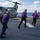 Sailors assigned to the forward-deployed amphibious assault ship USS America (LHA 6) conduct flight operations. Sailors assigned to the forward-deployed amphibious assault ship USS America (LHA 6) conduct flight operations.