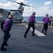 Sailors assigned to the forward-deployed amphibious assault ship USS America (LHA 6) conduct flight operations.