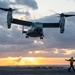 An MV-22B Osprey assigned to the 31st Marine Expeditionary Unit (MEU) lands on the flight deck of the forward-deployed amphibious assault ship USS America (LHA 6)