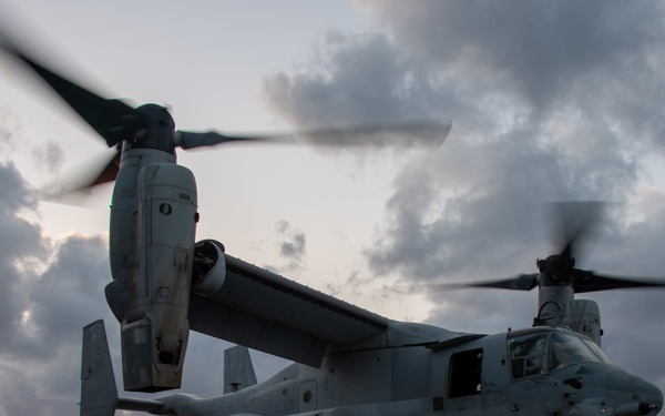 An MV-22B Osprey assigned to the 31st Marine Expeditionary Unit (MEU) lands on the flight deck of the forward-deployed amphibious assault ship USS America (LHA 6)