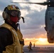 Sailor conducts flight deck operations