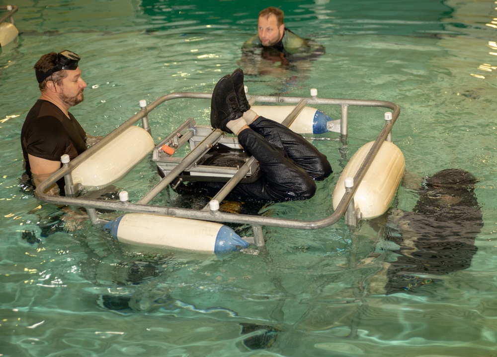 Marines participate in underwater engress training