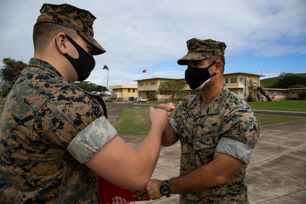 MCBH CO, Sgt. Maj. present awards to community