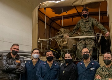 USS America (LHA 6) Sailors and Marines participate in training.