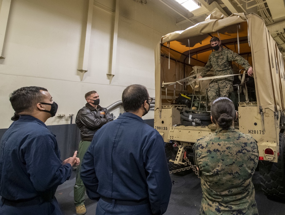 USS America (LHA 6) Sailors and Marines participate in training.