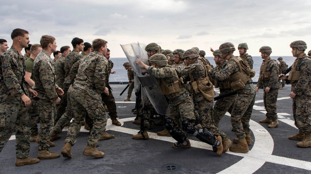 BLT 3/4 practices riot control on the flight deck