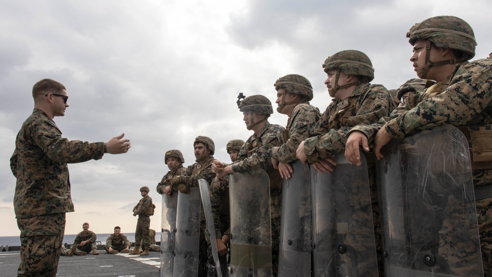 BLT 3/4 practices riot control on the flight deck