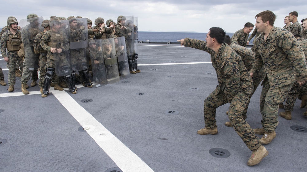 BLT 3/4 practices riot control on the flight deck