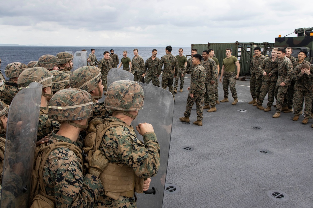 BLT 3/4 practices riot control on the flight deck