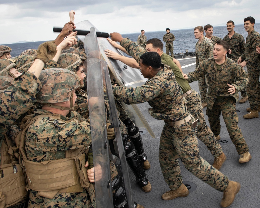 BLT 3/4 practices riot control on the flight deck