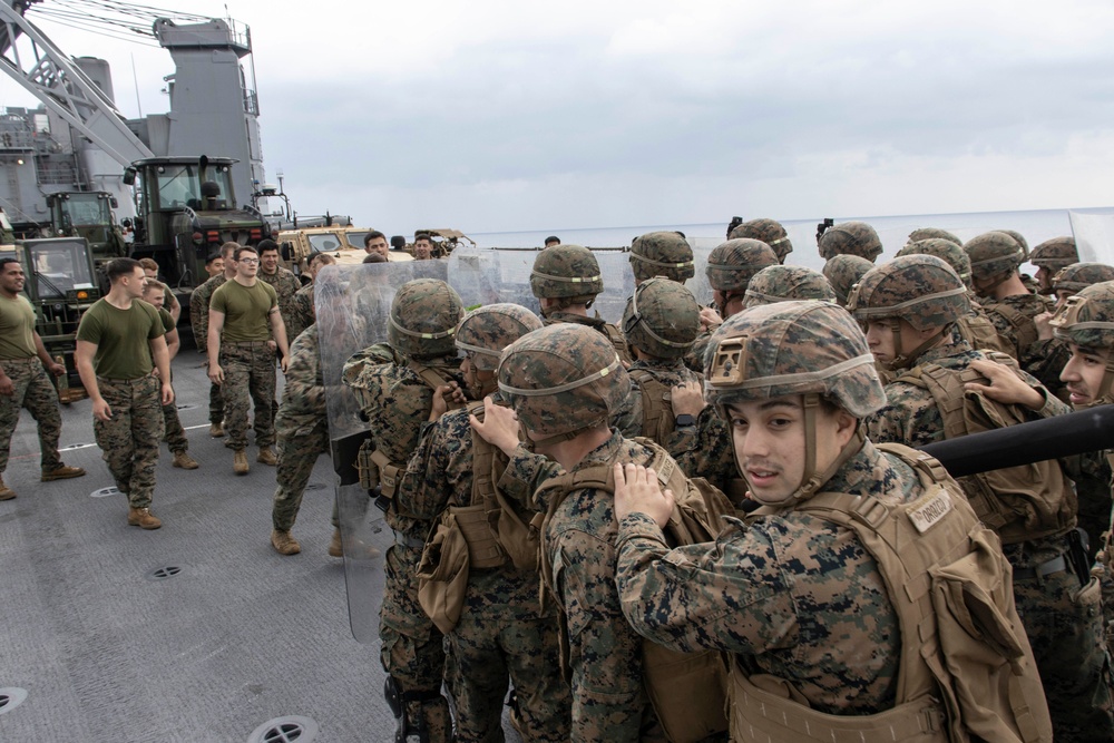 BLT 3/4 practices riot control on the flight deck