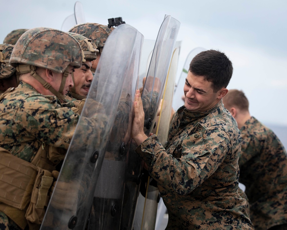 BLT 3/4 practices riot control on the flight deck