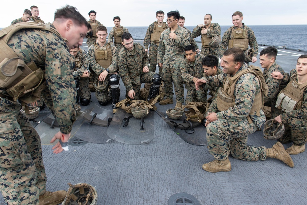 BLT 3/4 practices riot control on the flight deck