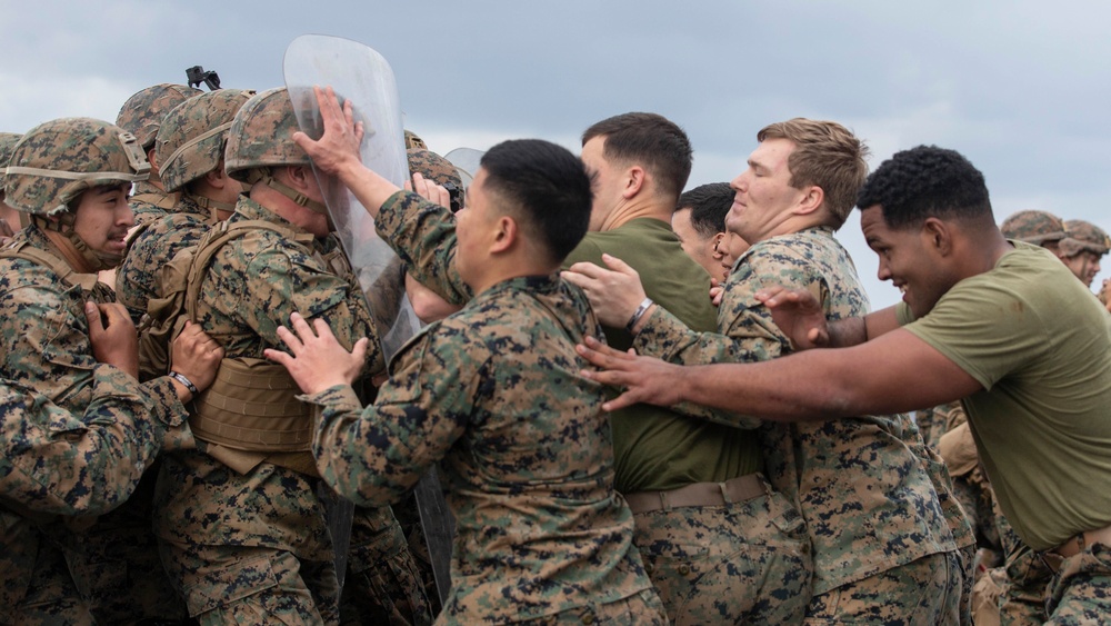 BLT 3/4 practices riot control on the flight deck