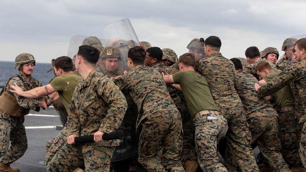 BLT 3/4 practices riot control on the flight deck