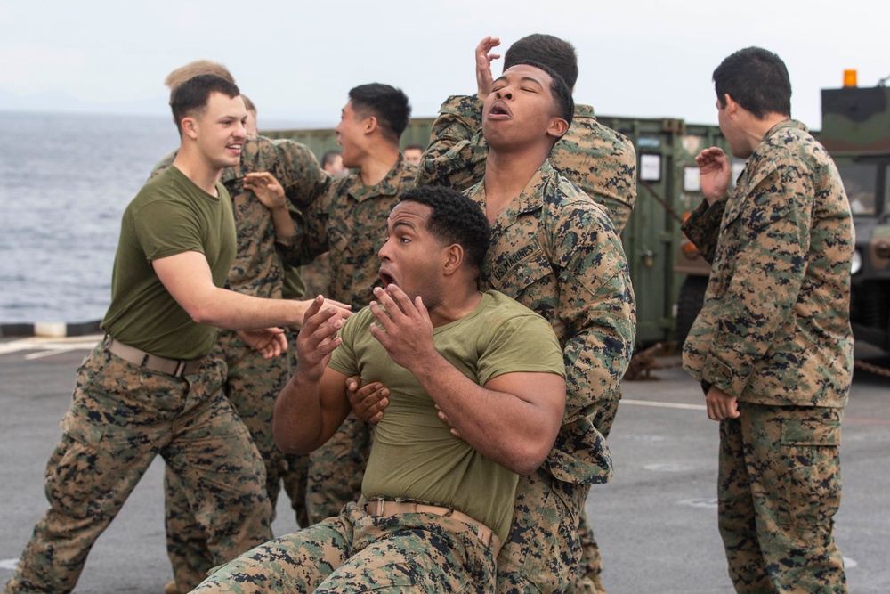 BLT 3/4 practices riot control on the flight deck