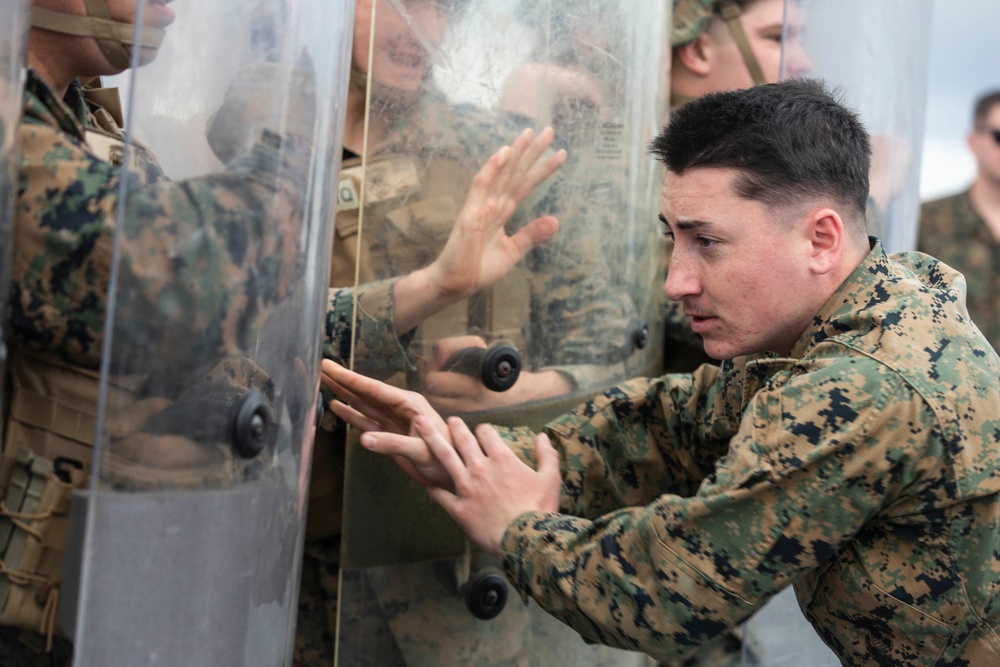 BLT 3/4 practices riot control on the flight deck