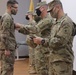 Sergeant Major Young promotes Sergeant Nowak to Staff Sergeant